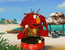 elmo from sesame street is playing drums on the beach