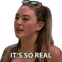 a woman wearing sunglasses says it 's so real on her face