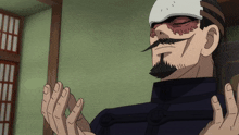 a man with a beard and mustache is wearing a white mask