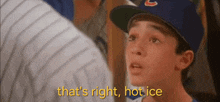 a young boy in a cubs hat says that 's right hot ice