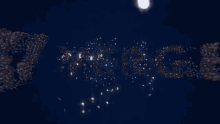 the word merry christmas is written in sparkles on a dark blue background