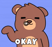 a cartoon teddy bear says okay with its paw up
