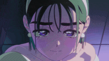 a close up of a girl 's face with purple eyes