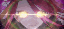 a close up of a woman 's face with glowing eyes .