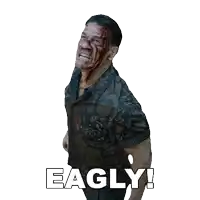 a man with blood on his face has the word eagly on the bottom