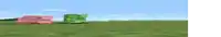 a pink pig and a green creeper are standing in a field .
