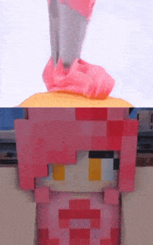 a person wearing pink socks is standing next to a minecraft character with pink hair .