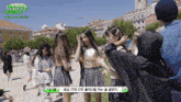 a group of girls are standing in a park with making jeans written on the bottom right