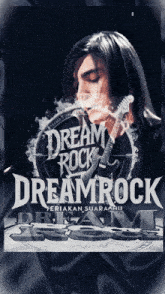 a poster for dream rock with a man smoking a cigarette