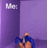 a woman in a blue bodysuit is kneeling on the floor with the words " me " written above her
