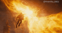 a picture of a man flying through a fire with the hashtag avantika0902