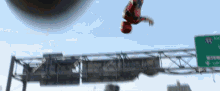 a person is doing a flip over a highway sign that says i 95
