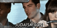 a group of people are sitting in a car with the words judaism son written on the screen
