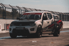a race car with the word racing on the side