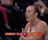 a basketball game is being played between the con 50 and atl 63