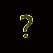 a gold question mark is on a black background