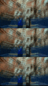 a blurry picture of a man wearing a blue shirt that says ' i love you ' on it