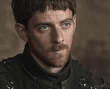 a close up of a man 's face with the words lord-aldhelm.gifs below