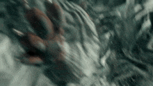 a close up of a person 's hand reaching out towards something