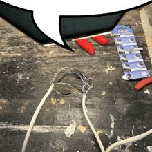 a packet of licb batteries sits on a wooden surface