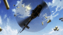 a helicopter is flying through a blue sky with bullets falling from it