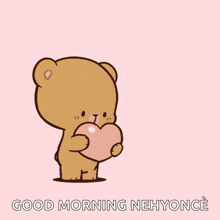 a teddy bear holding a heart with the words good morning nehyonce written below it