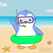 a penguin wearing goggles and a scuba mask is on the beach