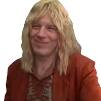 a man with long blonde hair wearing a red jacket