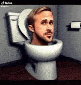 a man is sitting in a toilet with his head sticking out of it