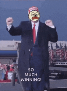 a man in a suit and tie with a cartoon face on his face and the words so much winning on the bottom