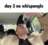 a man in a car drinking from a bottle with the words day 3 no whispangle below him