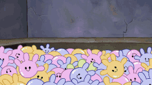 a bunch of cartoon rabbits with smiley faces