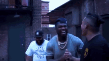 Laughing 50cent GIF
