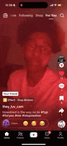 a screenshot of a tik tok app with a red background