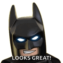 a lego batman says looks great with a smile on his face