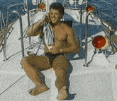 Guy-sitting-on-sailboat Talking-on-phone GIF - Guy-sitting-on-sailboat Sailboat Talking-on-phone GIFs