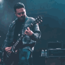 Playing The Guitar Rotting Out GIF - Playing The Guitar Rotting Out Last Man Standing Song GIFs