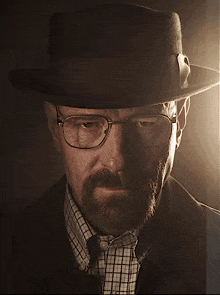 a man wearing a hat has a yellow circle behind his face