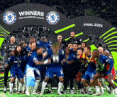 a group of soccer players celebrate winning the uefa conference league final