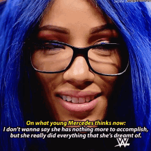 a woman with blue hair and glasses says on what young mercedes thinks