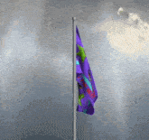 a purple flag on a pole that says ' liberty ' on it