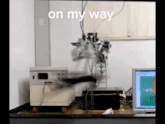 a computer monitor with the words on my way at the top of it