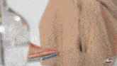 a woman 's legs are shown with a dico logo on the bottom