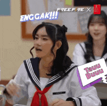 a girl in a sailor suit holding a sign that says tauu bubu