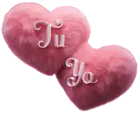 two pink furry hearts with the words tu yo on them