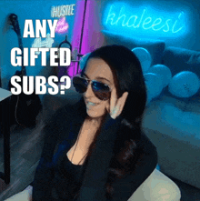a woman wearing sunglasses says " any gifted subs ? "