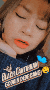 a woman with her eyes closed and the words black cantikhan godain dede bang on the bottom