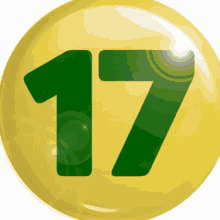 a yellow button with the number 17 in green on it