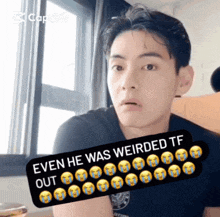 a man with a sticker that says even he was weirded tf out