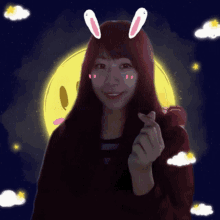 a girl with bunny ears and the word ho written on the bottom